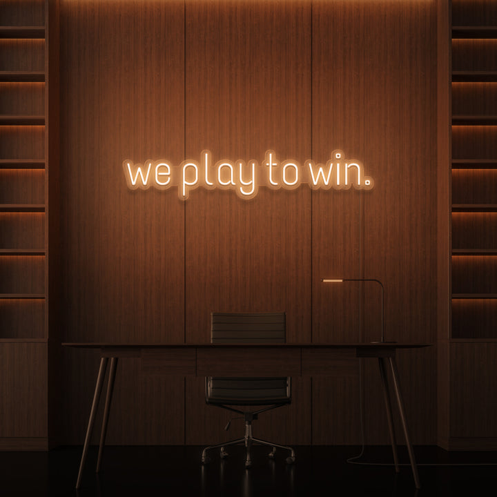 "WE PLAY TO WIN." NEON SKILT